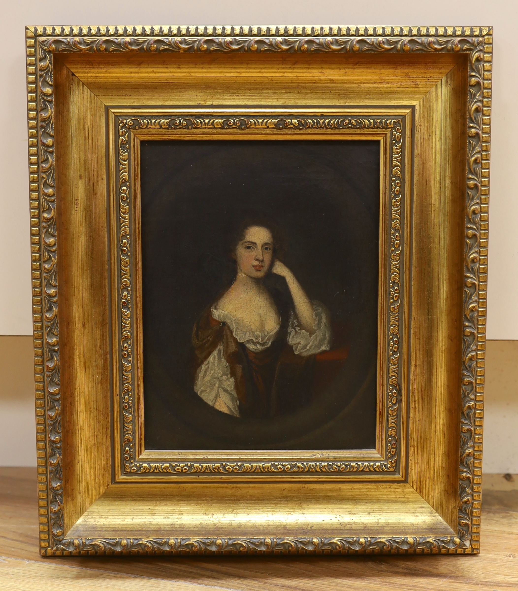 19th century English School, oil on canvas, Portrait of a lady wearing 17th century dress, feined oval, 21 x 16cm
